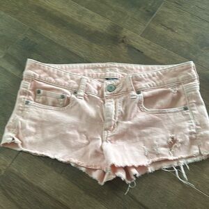 American Eagle distressed shorts light peach color